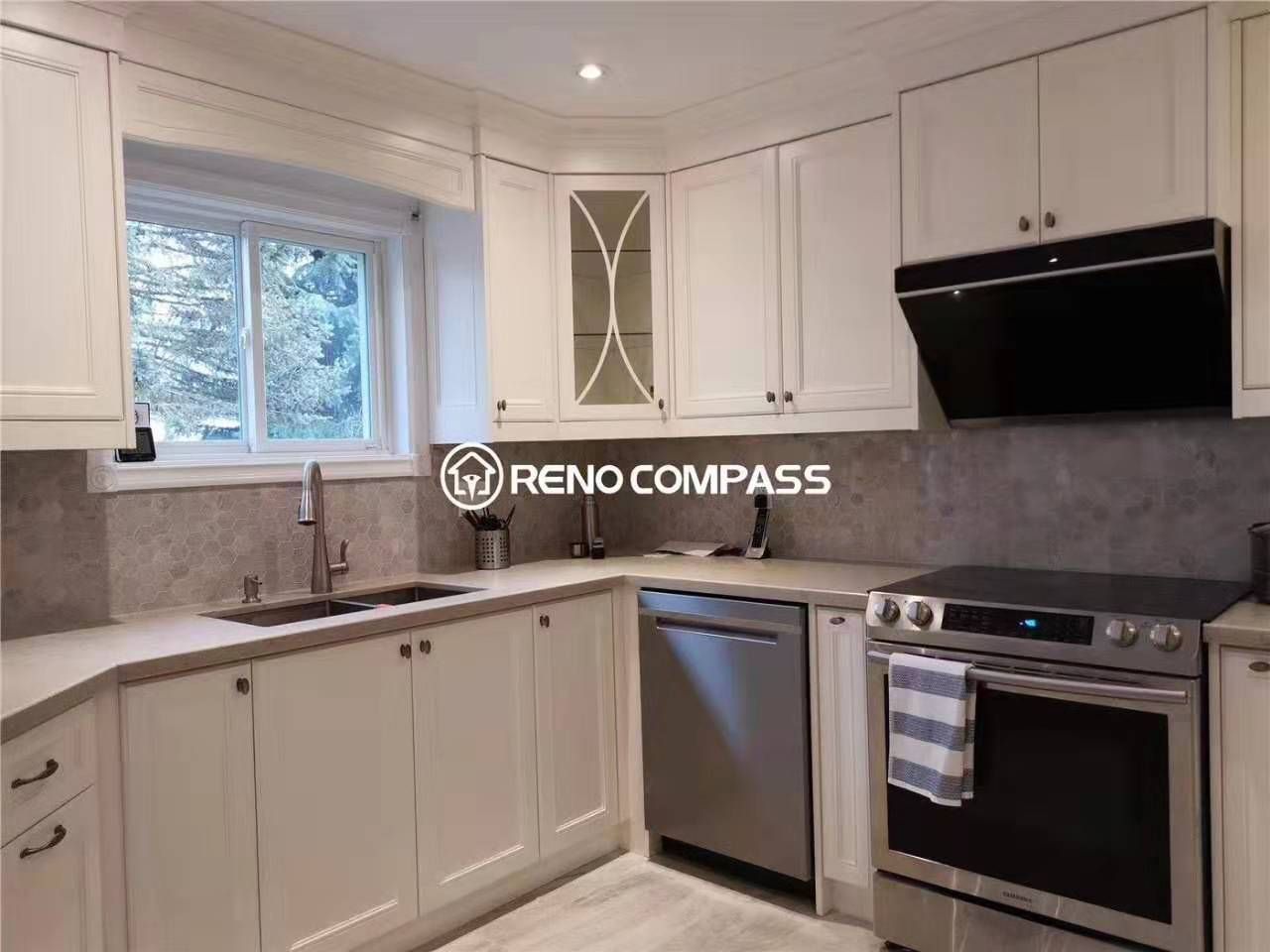 This open-concept kitchen renovation in Markham features custom cabinetry, durable countertops, and a functional peninsula layout designed for modern family living. Large windows bring in natural light, enhancing the bright and welcoming atmosphere, while upgraded lighting fixtures add depth and warmth to the space. Completed by a professional Toronto renovation company, this kitchen upgrade focuses on practical workflow, increased storage, and timeless finishes, making it ideal for homeowners looking to improve both functionality and everyday comfort.