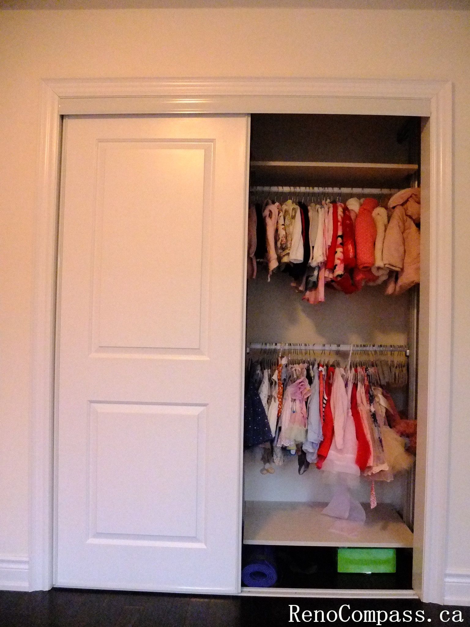 This Toronto closet cabinet upgrade features a clean sliding door system with a functional built-in drawer unit and hanging space. The design maximizes storage efficiency while keeping a modern and minimal look, perfect for organizing clothes and daily essentials in compact bedrooms.