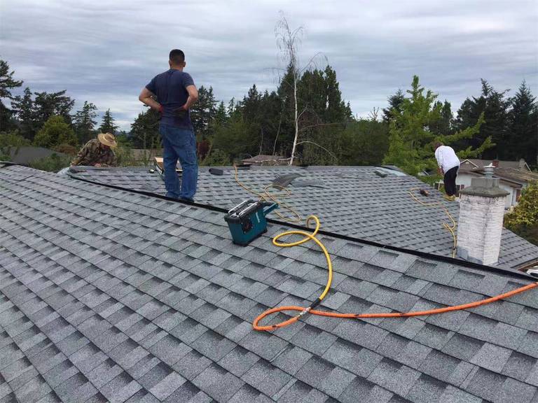 This image highlights a completed roofing replacement project in Toronto, featuring newly installed asphalt shingles designed for durability and long-term weather protection. The roofing system includes properly aligned shingle installation and upgraded roof ventilation units to improve airflow and prevent moisture buildup. Careful attention was given to roof slope consistency, flashing details, and overall finishing to ensure reliable performance through Toronto’s harsh winters and seasonal changes. Completed by an experienced Toronto roofing and renovation team, the project enhances both structural protection and the home’s exterior appearance while maintaining high installation standards.