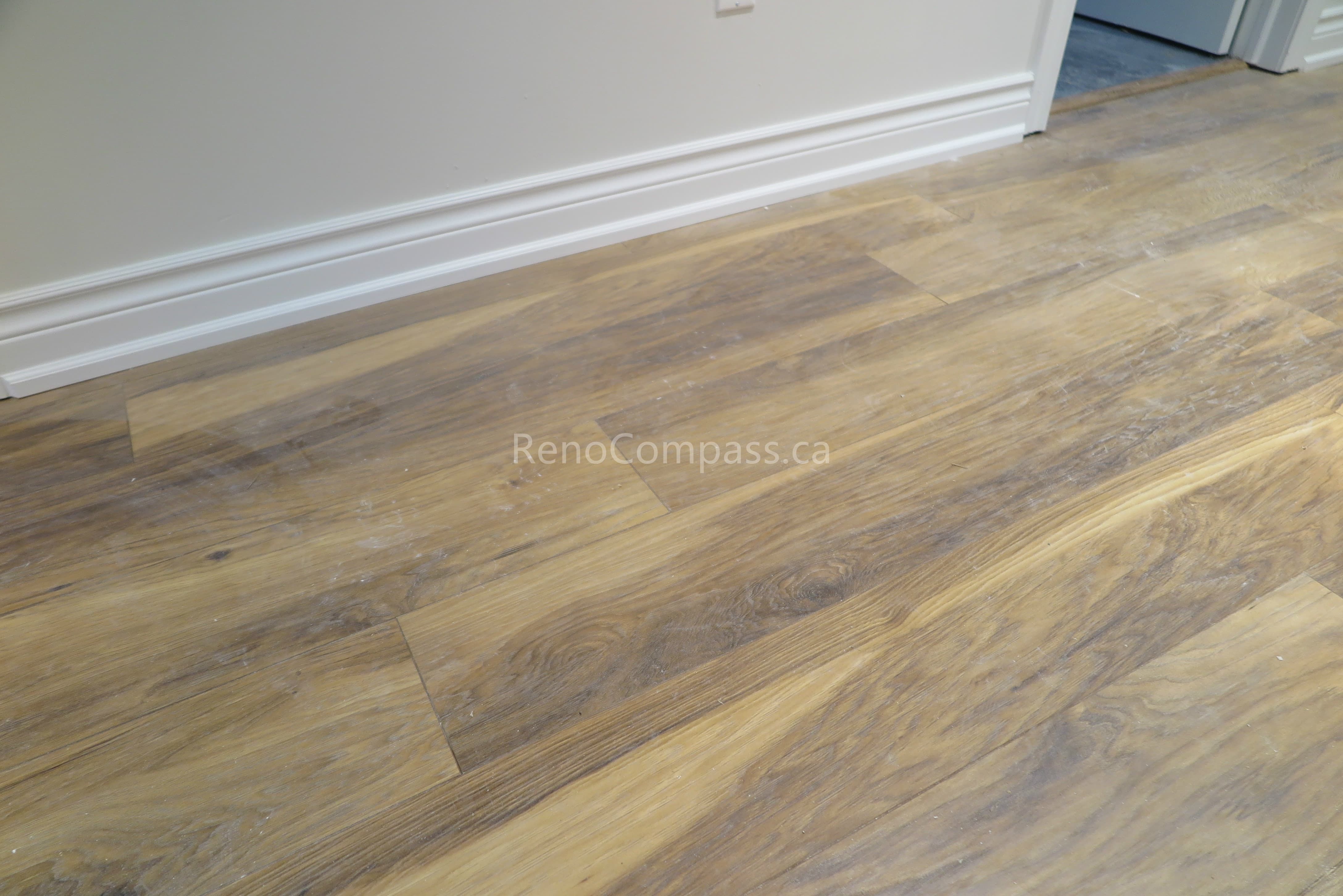 This North York interior renovation features newly installed engineered hardwood flooring that enhances warmth, durability, and overall visual continuity throughout the home. Completed by a professional Toronto renovation company, Reno Compass focuses on precise flooring alignment, clean baseboard finishing, and high-quality material selection to create a modern and comfortable living environment.