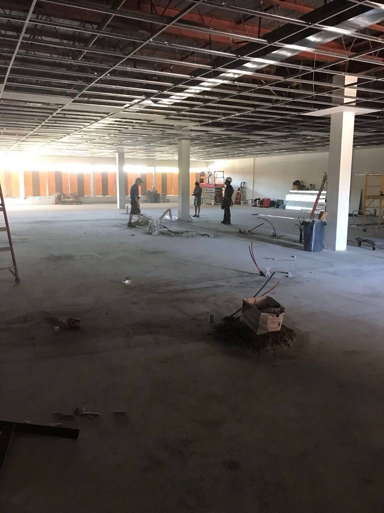 This Toronto commercial renovation project highlights the early-stage interior preparation of a large open commercial unit. The existing ceiling system has been exposed to allow for mechanical, electrical, and structural upgrades, creating a clean foundation for a full office and commercial build-out.

The spacious layout provides flexibility for future partition installation, suspended ceilings, and customized workspace design. As part of a comprehensive Toronto commercial renovation, this phase ensures proper planning, code compliance, and efficient workflow integration for businesses operating in the GTA.