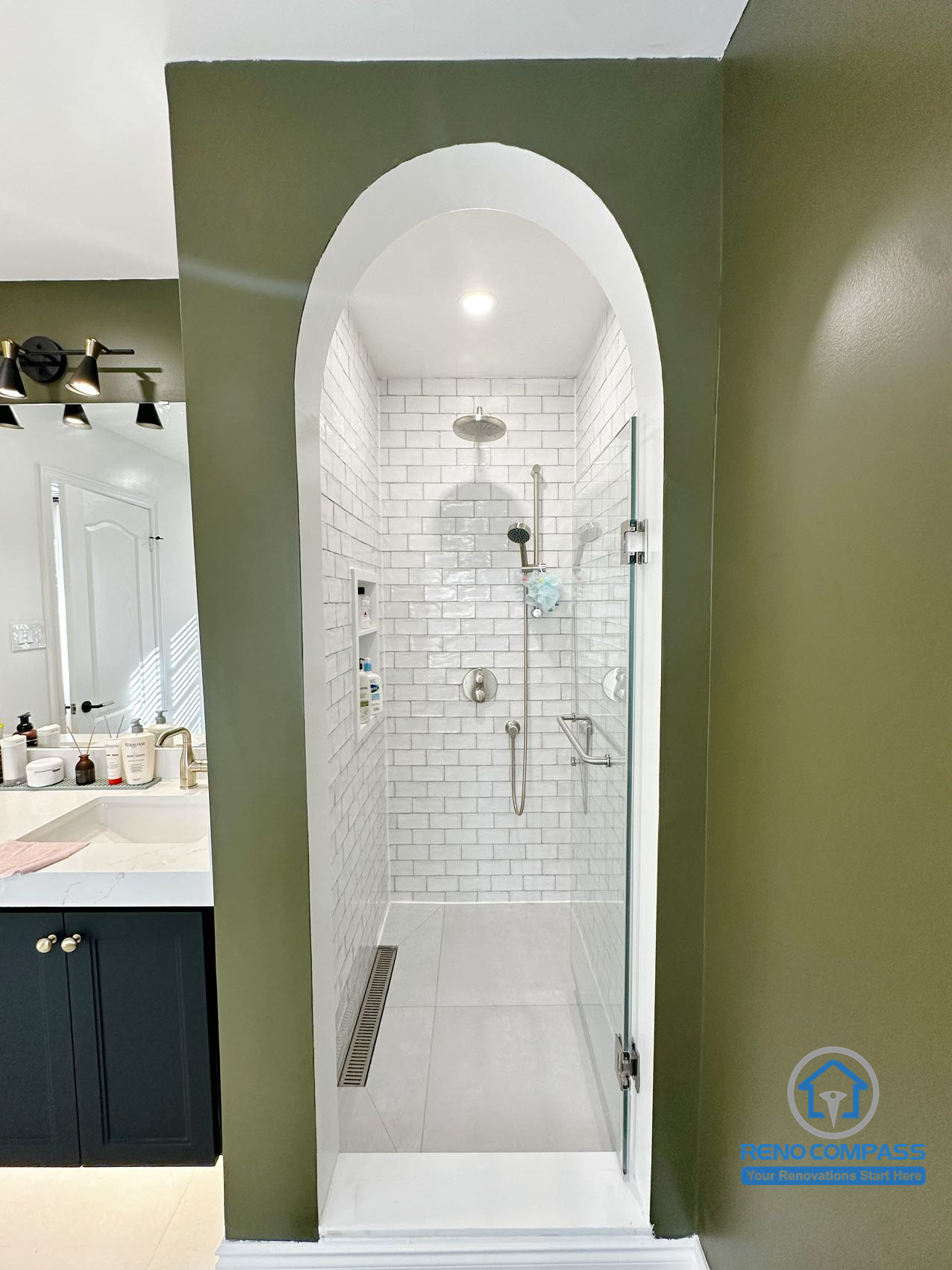 Interior shower space from a Markham renovation project, showing a simple and well-organized layout.