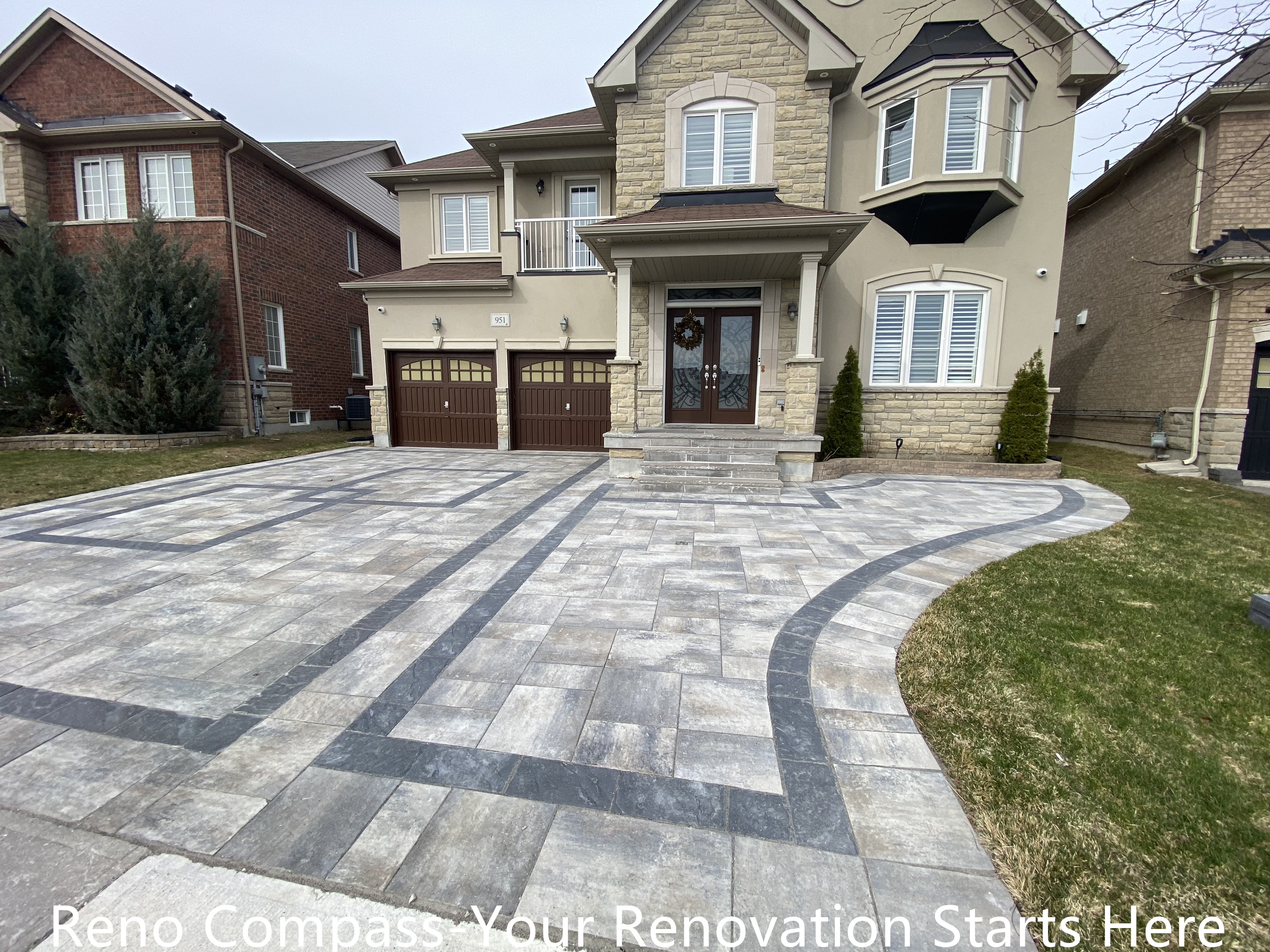 Completed interlocking driveway renovation in Newmarket featuring a large-scale front yard hardscape with patterned concrete pavers and contrasting border lines. The upgraded driveway enhances curb appeal, provides a durable parking surface, and complements the home’s exterior architecture. Designed and installed by a trusted Toronto renovation company specializing in high-quality residential exterior renovations.