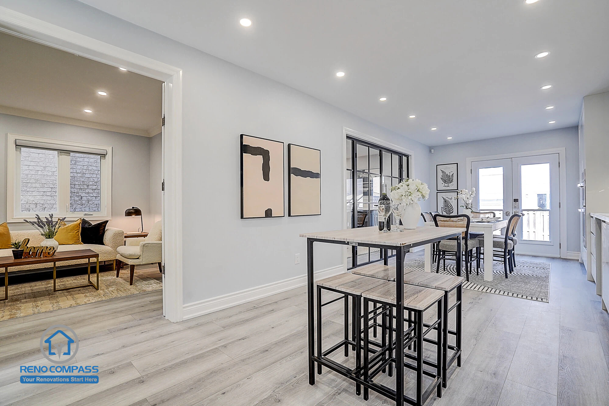 New flooring installation in Vaughan interior renovation project, featuring grey tone wood flooring that creates a clean and unified look.