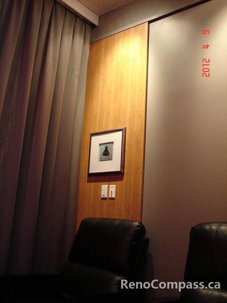 This Toronto beauty salon renovation features a cozy and elegant waiting area designed to provide comfort and relaxation for clients. Warm wood panel finishes, soft ambient lighting, and modern seating create a welcoming spa-like lounge atmosphere. Thoughtfully designed to enhance the overall client experience, this commercial salon interior reflects professional craftsmanship and contemporary aesthetics by a trusted Toronto renovation company.
