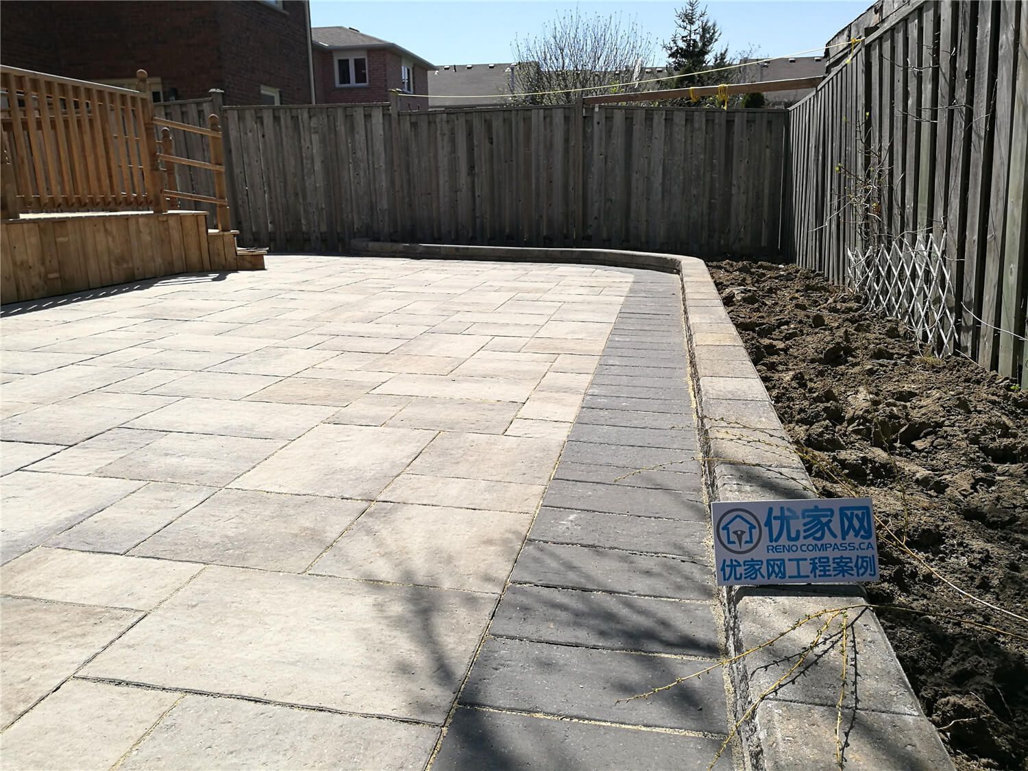 This Richmond Hill landscaping renovation showcases a newly completed backyard patio with large-format interlocking stone installation. Designed for durability and modern outdoor living, the spacious patio features clean lines, contrasting border stones, and precise leveling for proper drainage. The upgraded hardscape creates a functional entertainment area perfect for family gatherings while enhancing the overall backyard layout and property value. Professional installation ensures long-lasting performance, weather resistance, and a refined outdoor finish suitable for all-season use in the GTA.