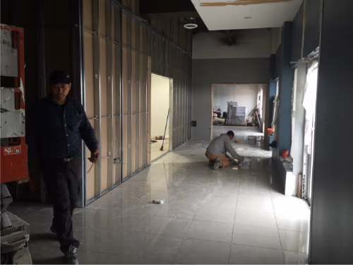 This image captures the construction phase of a 7000 sqft private club renovation project in Toronto, showing interior framing, partition wall installation, and flooring preparation in progress. The space is being carefully built to accommodate a high-end private club layout with designated lounge, entertainment, and functional areas.

Professional contractors are working on structural framing, electrical preparation, and detailed interior finishing to ensure quality and long-term durability. This project reflects the precision and planning required for large-scale commercial renovation by an experienced Toronto renovation team.