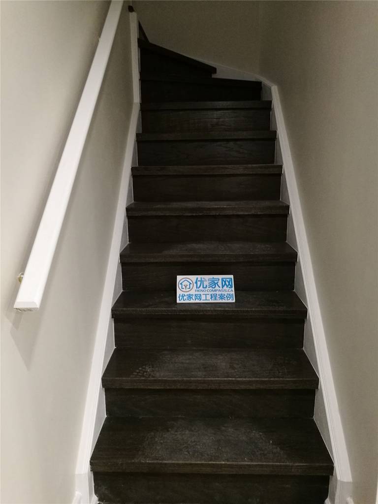 This Scarborough basement renovation includes a newly finished staircase featuring dark wood steps, clean white railings, and a modern neutral color palette. The updated stairway provides a safe and stylish transition between levels while complementing the overall basement design. Built for durability and everyday use, the staircase enhances both function and visual appeal. Completed by a professional Toronto renovation company, this project highlights quality craftsmanship and thoughtful basement renovation details.