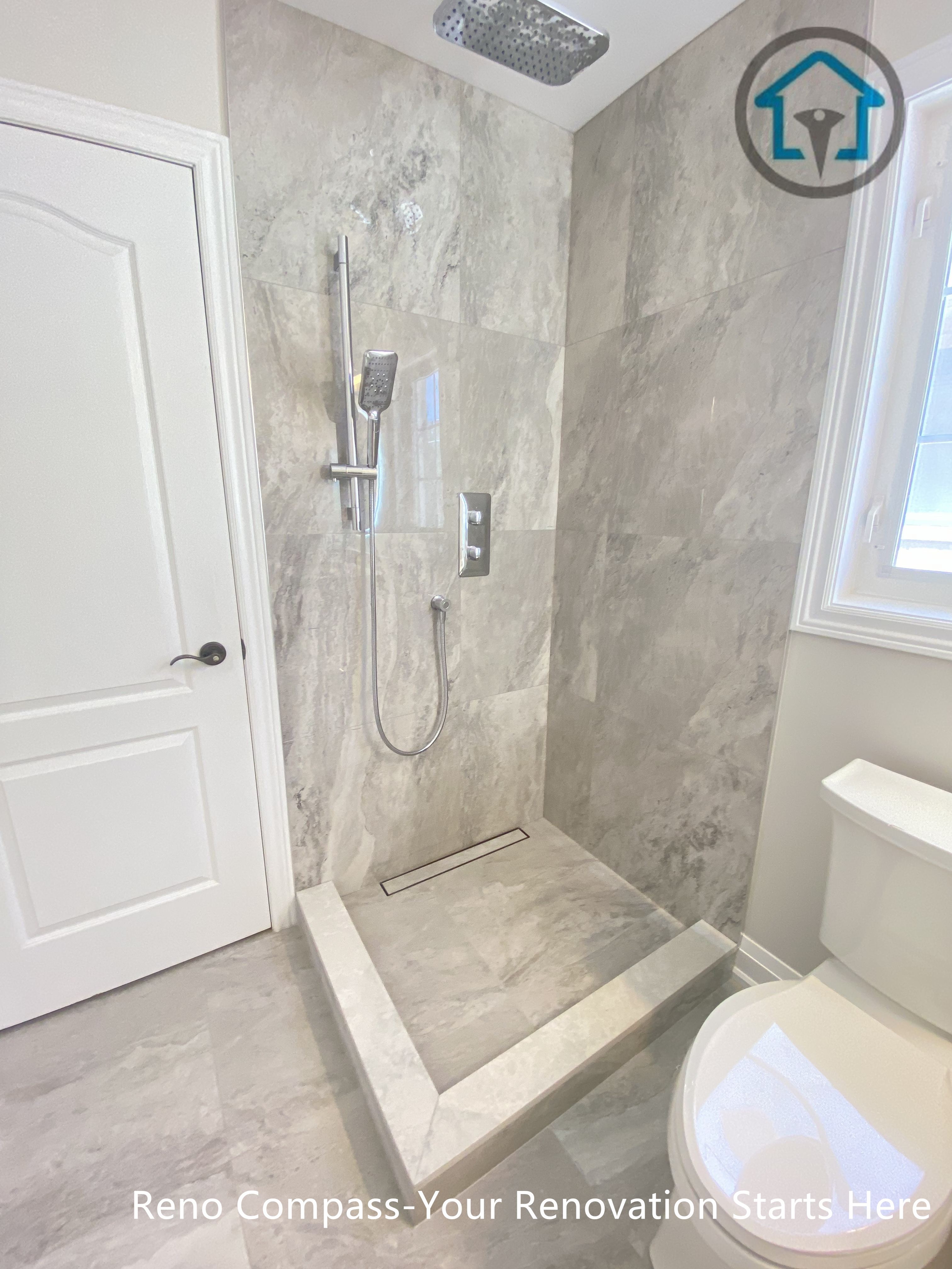 This Richmond Hill bathroom renovation features a walk-in shower with full-height tile walls, a recessed shower base, and modern fixtures. The clean layout and durable finishes improve everyday usability while maintaining a modern residential bathroom design, completed by a trusted Toronto renovation company.