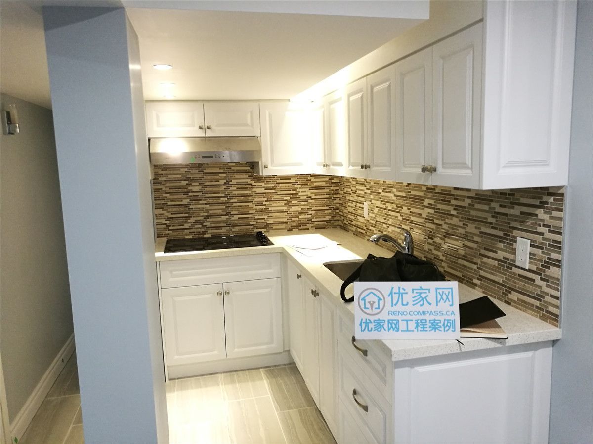 This image highlights custom built-in cabinets and shelving installed during a North York interior renovation. The combination of closed storage and open display shelves provides practical organization while maintaining a clean, modern appearance. Durable finishes and precise installation demonstrate the craftsmanship expected from an experienced Toronto renovation company.