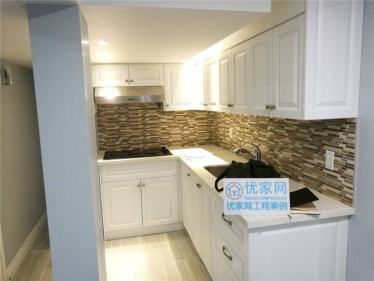 This image highlights custom built-in cabinets and shelving installed during a North York interior renovation. The combination of closed storage and open display shelves provides practical organization while maintaining a clean, modern appearance. Durable finishes and precise installation demonstrate the craftsmanship expected from an experienced Toronto renovation company.