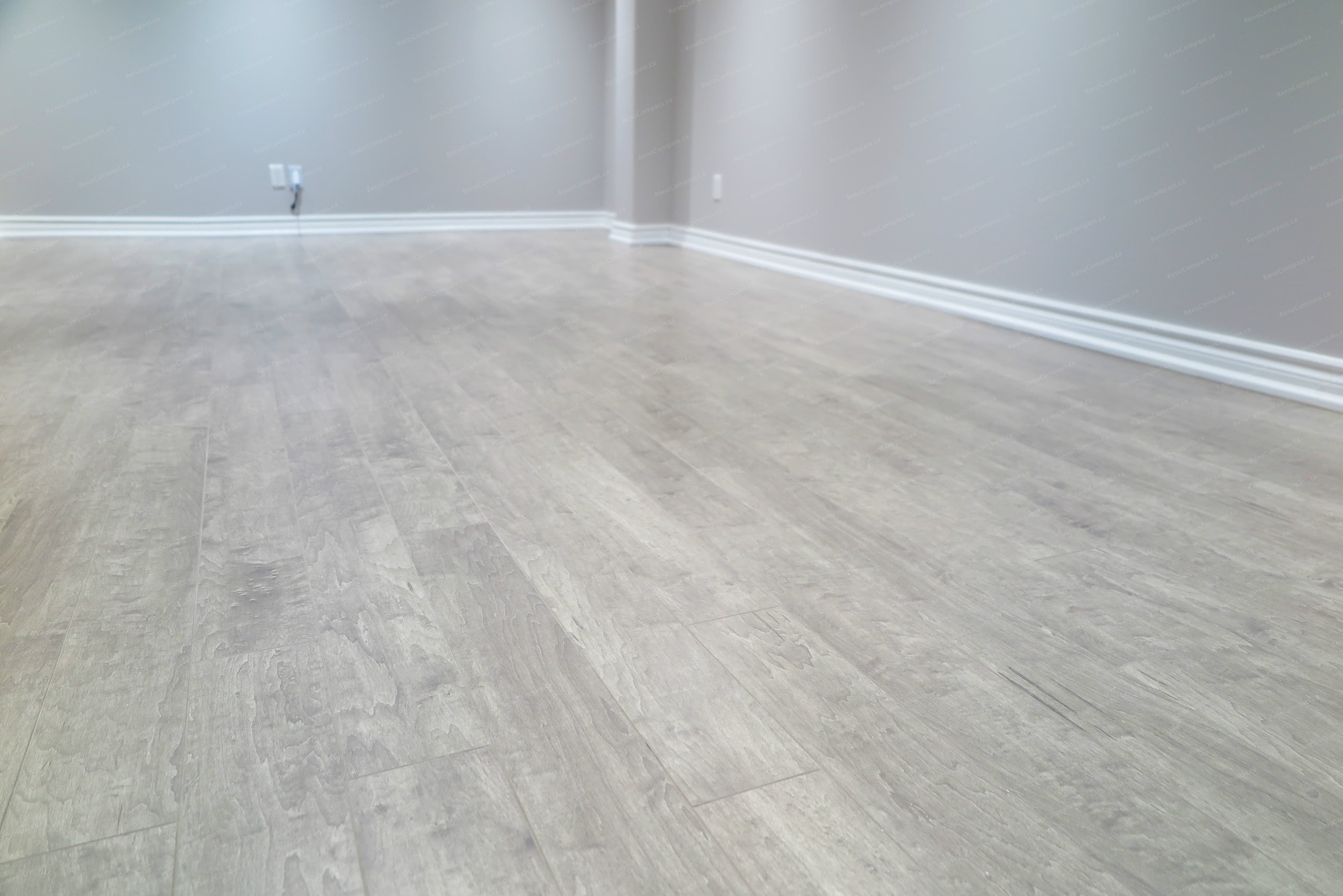 Durable and stylish flooring selected for this Richmond Hill basement renovation improves comfort, longevity, and overall visual cohesion.