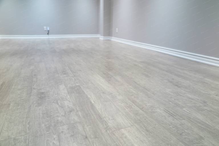 Durable and stylish flooring selected for this Richmond Hill basement renovation improves comfort, longevity, and overall visual cohesion.