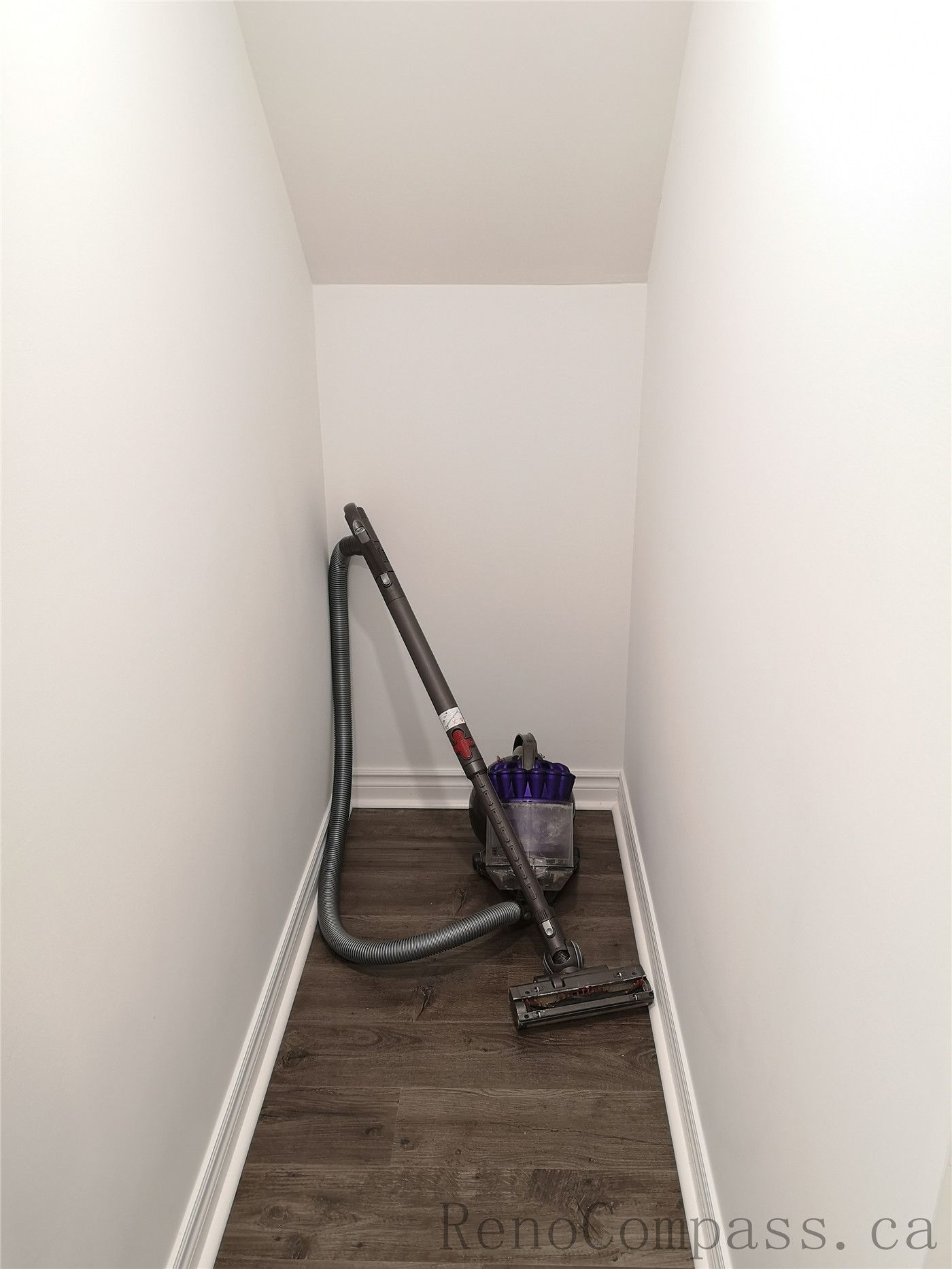 This Richmond Hill basement renovation includes a clean and modern hallway design featuring new interior doors, recessed pot lighting, and durable wood flooring. The neutral wall color and upgraded trim create a bright and cohesive transition between basement rooms. Completed by a trusted Toronto renovation company, Reno Compass Inc., this finished basement hallway enhances both functionality and visual flow throughout the space.
