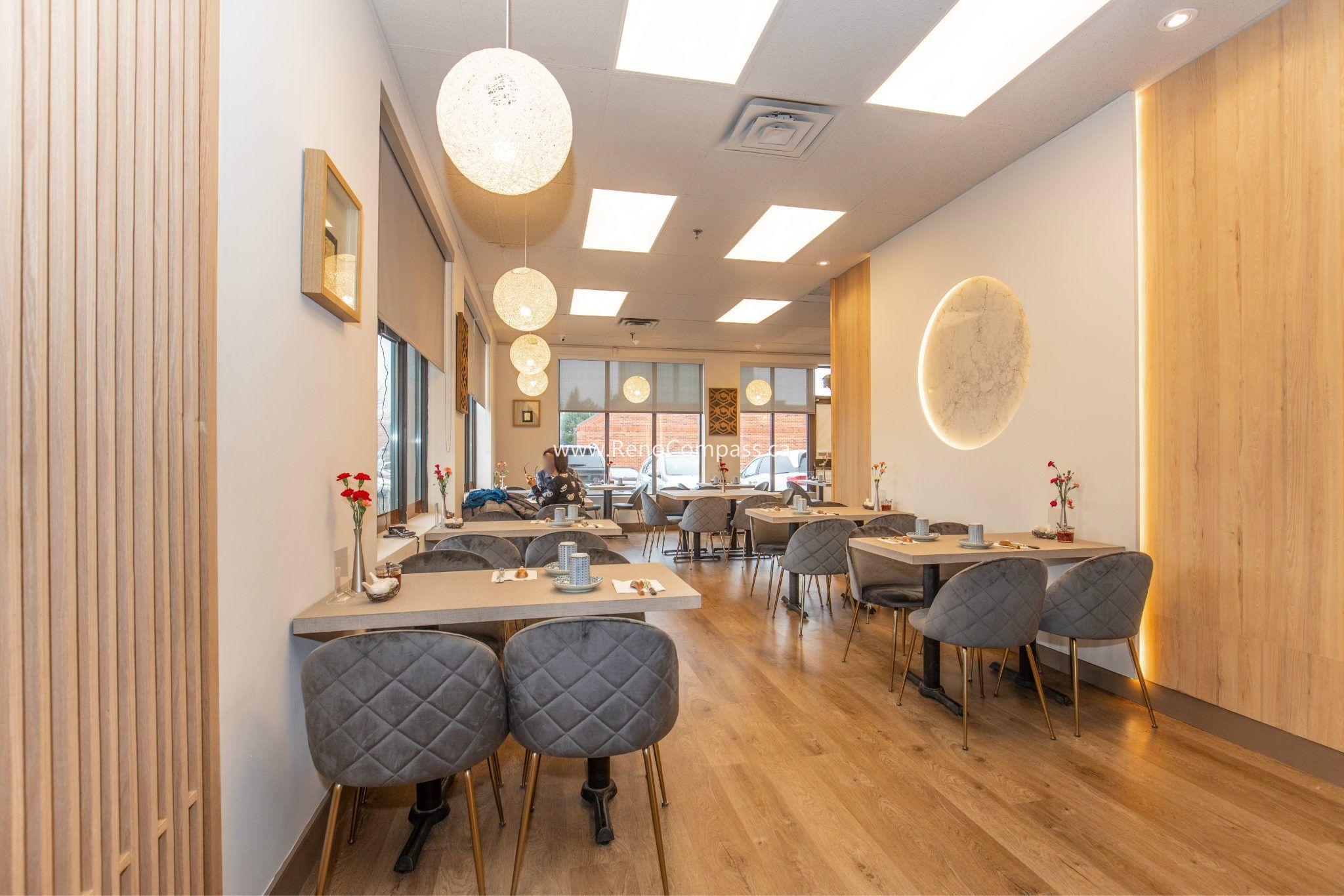This Richmond Hill Chinese restaurant renovation completed by Toronto renovation company Reno Compass Inc. showcases a bright and modern dining space designed for comfort and efficiency. The upgraded interior features warm wood flooring, custom wall finishes, elegant pendant lighting, and contemporary seating arrangements that enhance the overall dining experience. With a carefully planned layout and refined aesthetic details, the renovation creates a welcoming atmosphere for guests while improving functionality and flow for daily restaurant operations.
