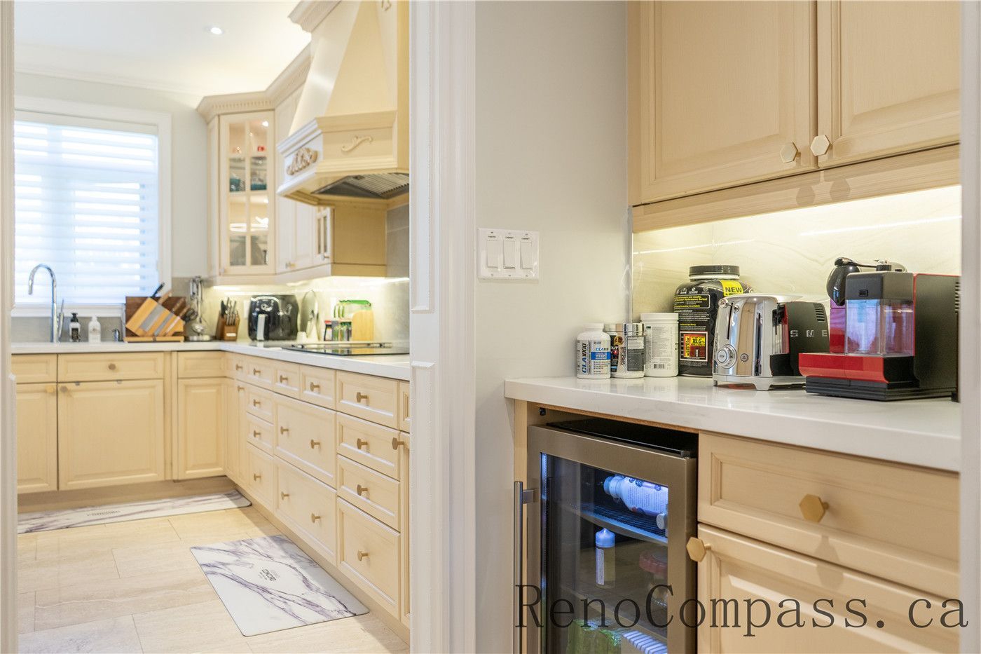 This Richmond Hill entire house interior renovation features a bright modern kitchen with custom cabinetry, quartz countertops, built-in storage, and upgraded lighting. Designed for functionality and elegance, the space reflects the quality craftsmanship of a professional Toronto renovation company, delivering a cohesive and timeless home interior upgrade.