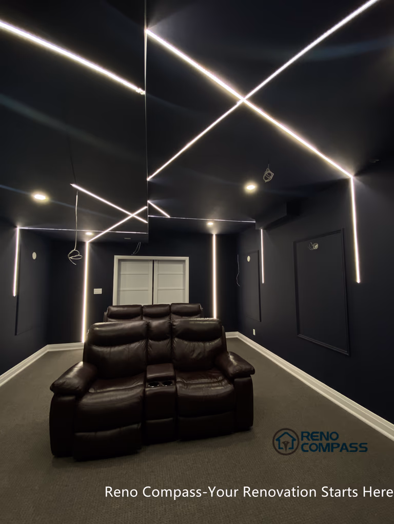 This Newmarket basement home theater renovation features a modern dark-tone design with custom recessed LED ceiling lighting, acoustic wall panels, and a dedicated media seating layout. Designed and built by an experienced Toronto renovation company, this basement transformation delivers a cinematic atmosphere while maintaining comfort, clean lines, and functional lighting control—ideal for family entertainment and private movie nights.