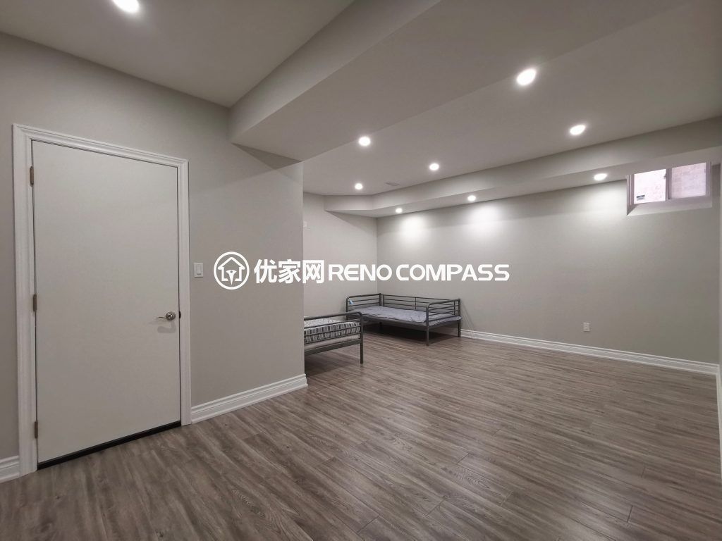 This Vaughan basement renovation features a fully finished living space with modern flooring, recessed pot lights, and a clean open layout designed for comfort and flexibility. The bright and spacious basement can be used as a bedroom, recreation room, or rental-ready living area. Completed by a professional Toronto renovation company, this project highlights quality finishing, efficient space planning, and contemporary design that adds both functionality and long-term property value.