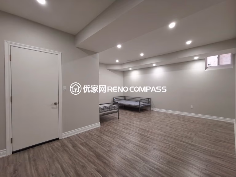 This Vaughan basement renovation features a fully finished living space with modern flooring, recessed pot lights, and a clean open layout designed for comfort and flexibility. The bright and spacious basement can be used as a bedroom, recreation room, or rental-ready living area. Completed by a professional Toronto renovation company, this project highlights quality finishing, efficient space planning, and contemporary design that adds both functionality and long-term property value.
