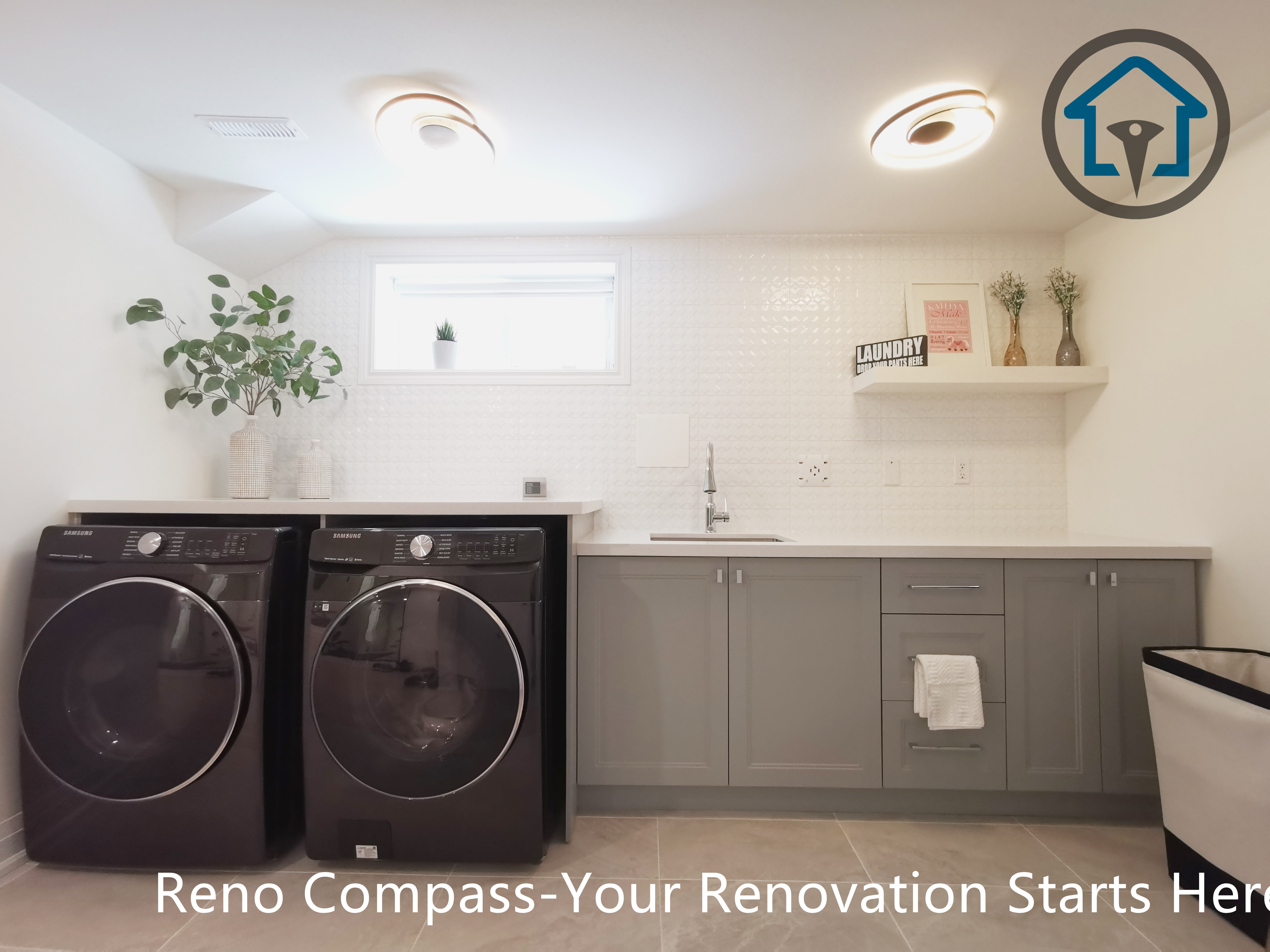 This North York basement renovation features a modern laundry room with built-in cabinetry, a quartz countertop, and a functional sink area. Front-load washer and dryer units are seamlessly integrated into the space, while soft lighting and neutral finishes create a clean and organized environment. Completed by a Toronto renovation company focused on practical layouts and long-term usability.