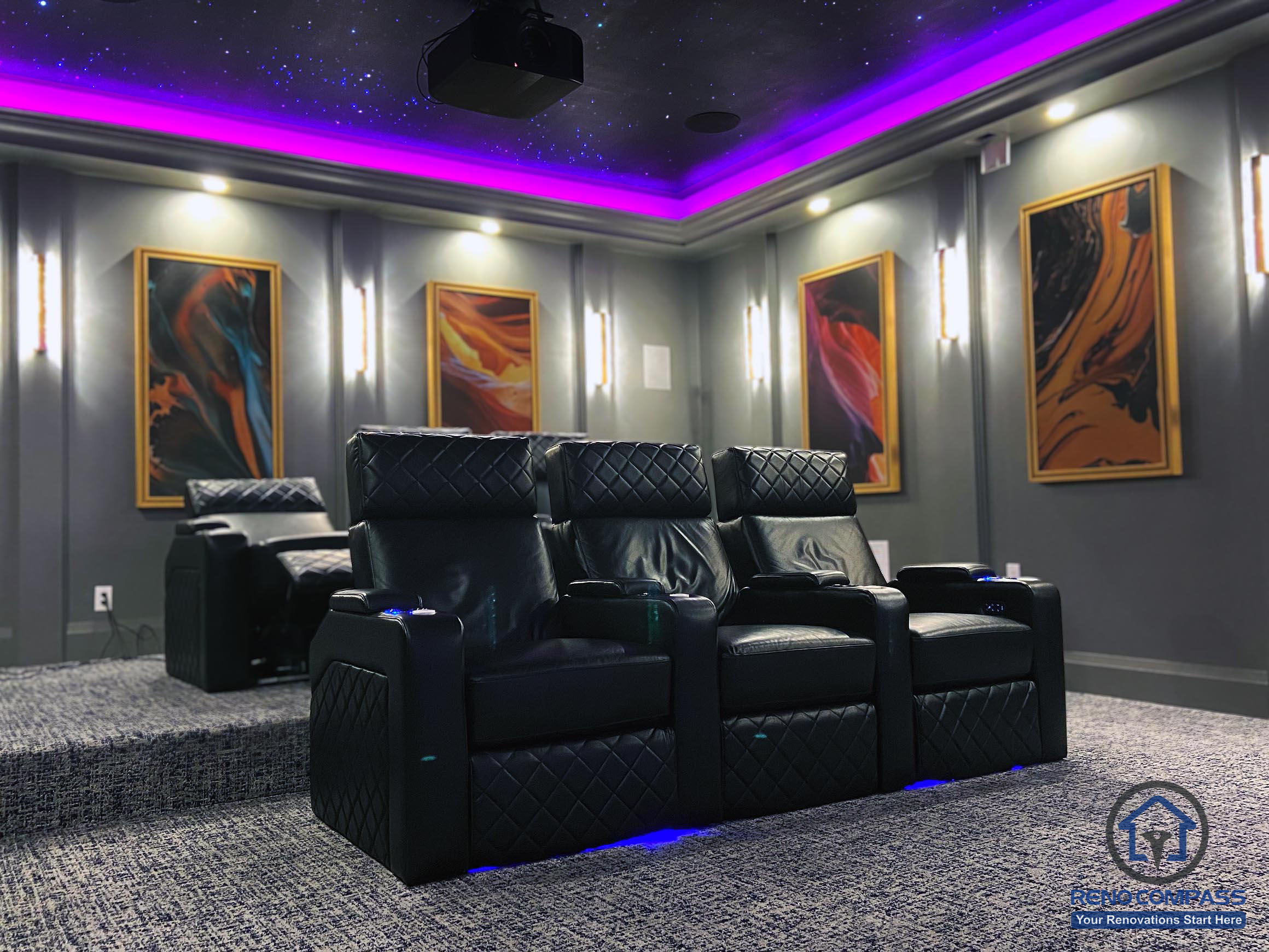 Full view of a custom home theatre renovation in Aurora featuring tiered seating, star ceiling, ambient LED lighting, and a large projection screen for immersive entertainment.