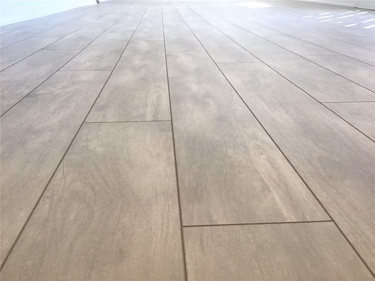 This Markham full home renovation features high-quality wood-look vinyl plank flooring with a realistic grain texture and seamless installation. The durable surface is designed for long-term performance, easy maintenance, and a clean modern aesthetic. Completed by a trusted Toronto Renovation Company, this flooring solution enhances both style and functionality throughout the home.