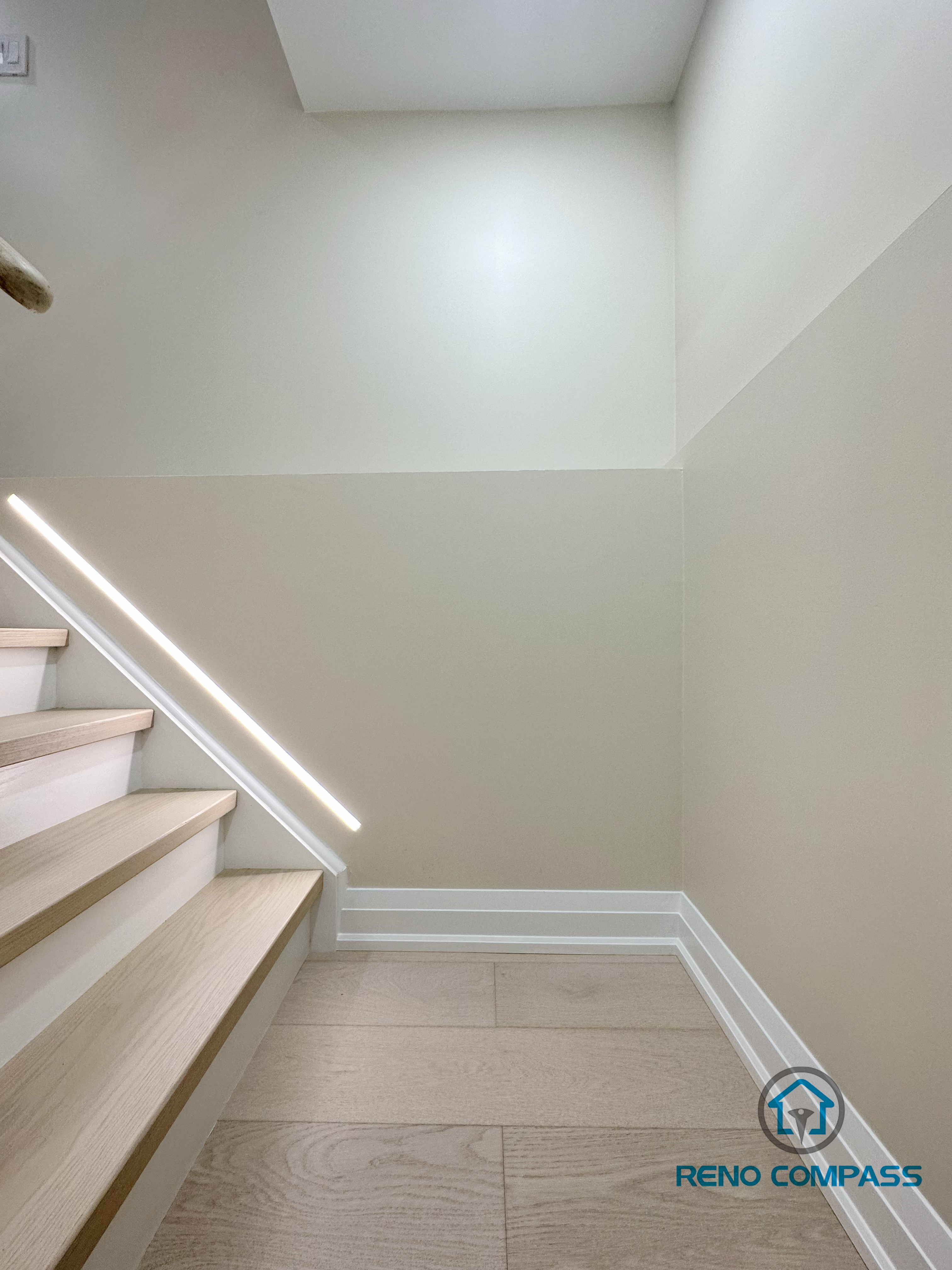 This image showcases our completed light wood staircase renovation in Vaughan. Featuring natural pale wood treads and minimalist metal railings, this design creates a warm, bright, and airy modern feel for the home. We specialize in custom interior renovations across the Greater Toronto and Vaughan area.