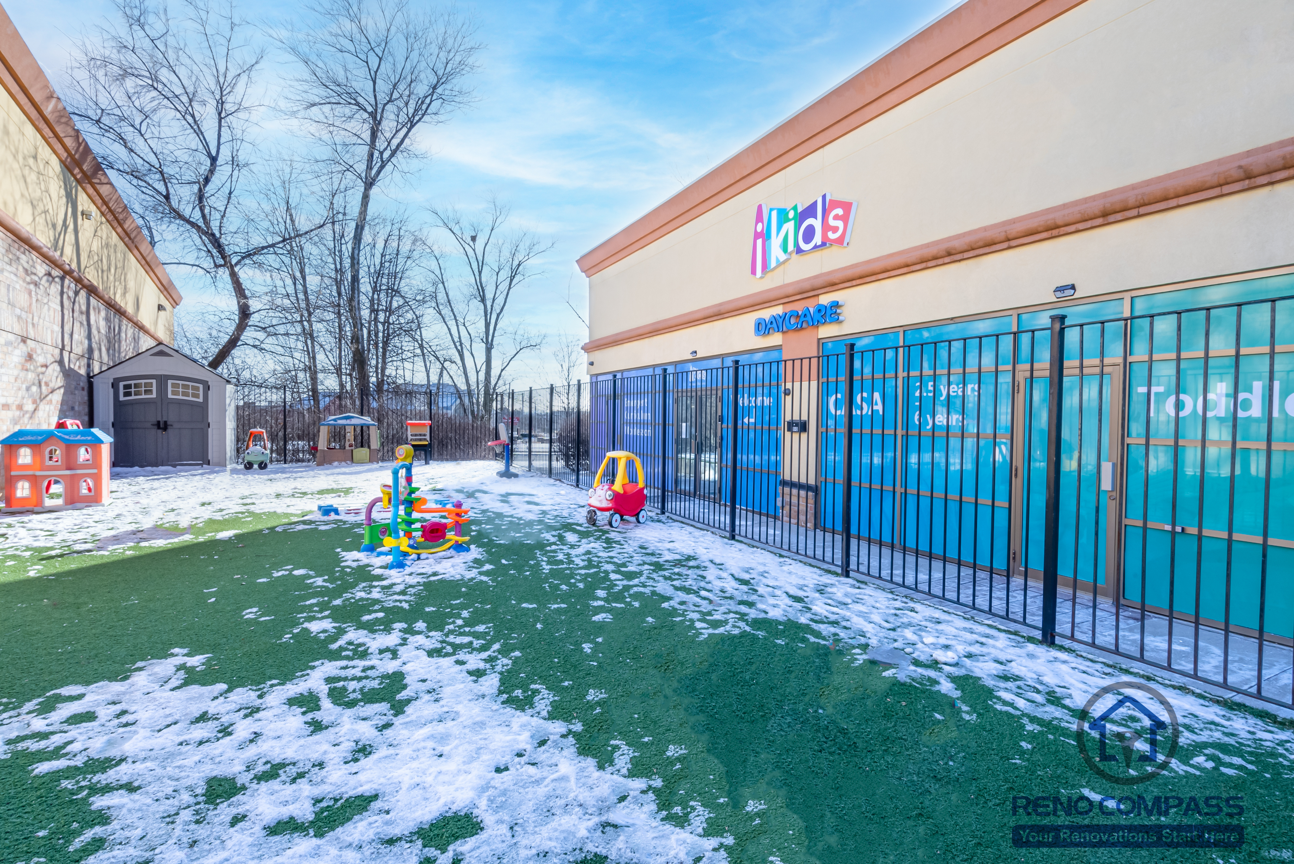 This Markham daycare renovation features a secure and thoughtfully designed outdoor play area that supports active play and daily outdoor activities for young children. The space includes child-safe play equipment installed on durable, low-maintenance turf, allowing year-round usability and easy cleaning. Perimeter fencing and controlled access points enhance safety and supervision, while the open layout encourages movement, exploration, and social interaction. Completed by a Toronto renovation company, Reno Compass Inc., this daycare renovation reflects a strong focus on safety compliance, durability, and functional outdoor design tailored for childcare facilities in Markham.
