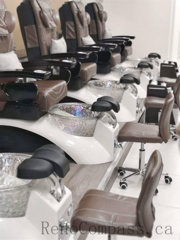 Modern nail spa commercial renovation in Toronto featuring luxury pedicure stations with built-in massage chairs, ergonomic seating, and integrated foot spa basins. This professional salon upgrade focuses on comfort, functionality, and a clean contemporary layout designed for high-traffic beauty businesses. Renovation completed by Reno Compass Inc., a trusted Toronto commercial renovation contractor specializing in nail salons and beauty spaces.
