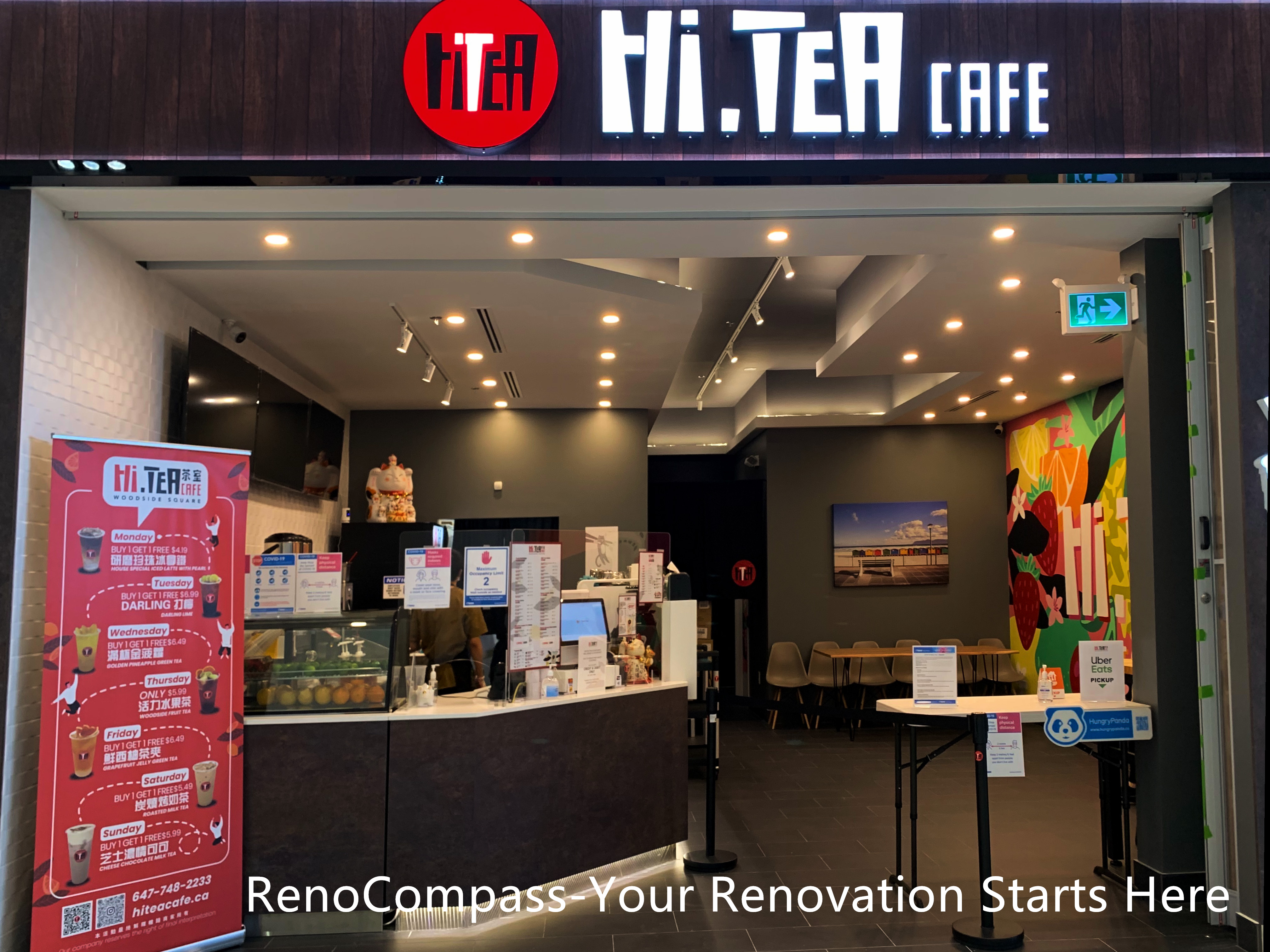 Restaurant renovation in Toronto featuring a modern storefront entrance, illuminated cafe signage, custom service counter, and open interior layout. Designed and built by Reno Compass Inc., this commercial renovation enhances street visibility, brand recognition, and customer flow for a high-traffic Toronto restaurant location.