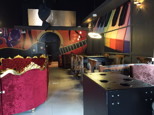 This 7000 sqft private club renovation project in Toronto showcases a unique music-themed interior design with vibrant wall art, custom lounge seating, and luxury finishes. The space is carefully planned to create an upscale entertainment environment featuring private seating areas, artistic lighting, and a modern lounge layout that enhances both comfort and visual impact. Completed by a professional Toronto renovation team, this project highlights creativity, functionality, and premium craftsmanship tailored for high-end private club experiences.