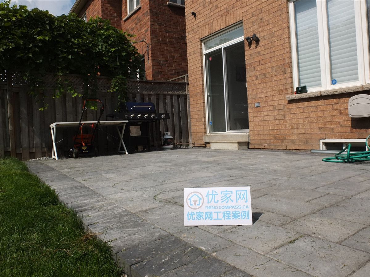 This image showcases a completed backyard interlock patio landscaping project in Markham. High-quality interlocking pavers were professionally installed to create a clean, durable outdoor patio area that integrates seamlessly with the lawn, enhancing both functionality and curb appeal for residential outdoor spaces.