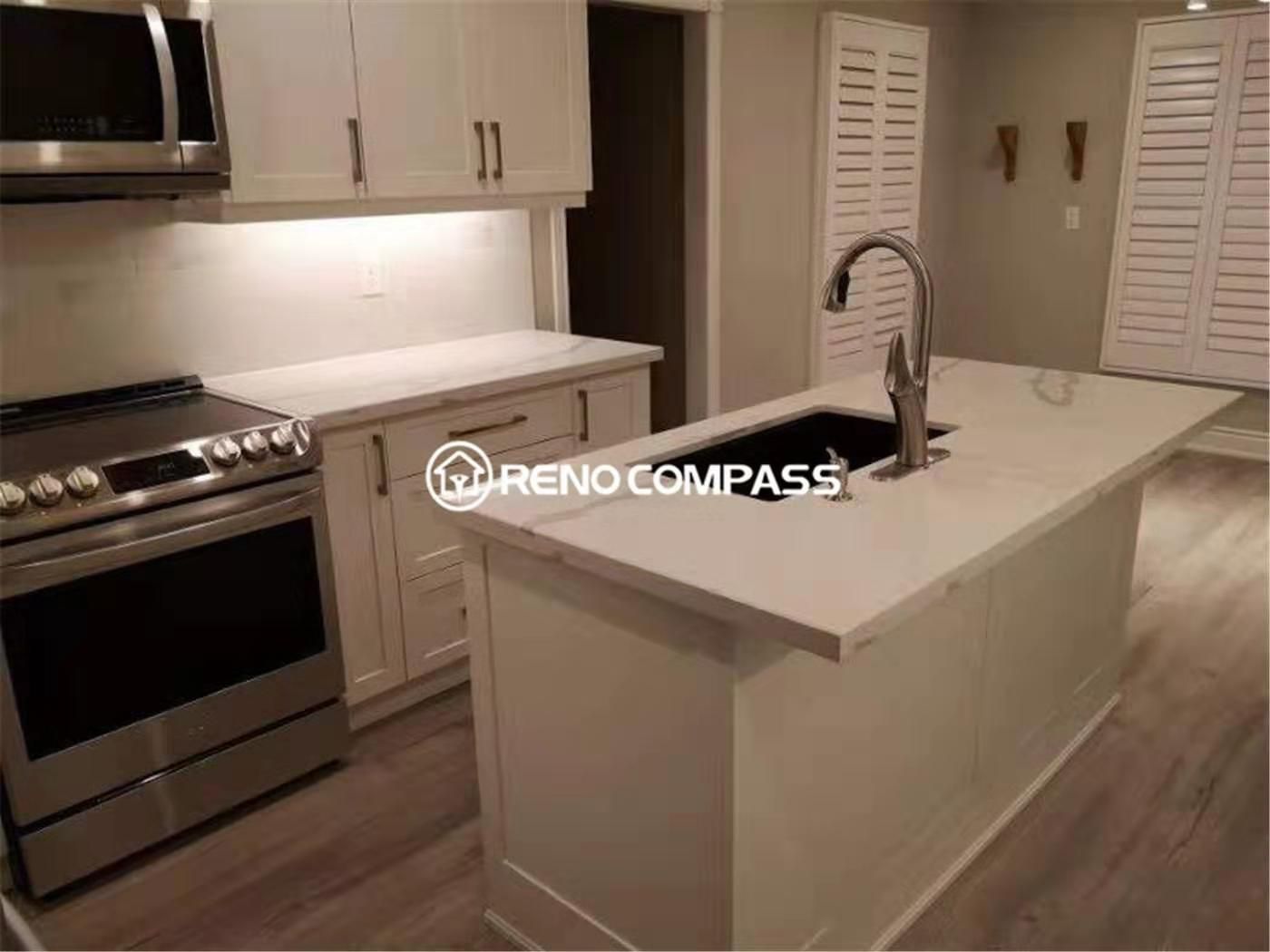 This modern kitchen renovation project in Mississauga features custom white shaker cabinets, quartz countertops, and a functional central island designed for everyday cooking and entertaining. Completed by a professional Toronto renovation company, the space combines clean cabinetry lines, upgraded lighting, and durable flooring to create a bright and highly functional kitchen environment. Stainless steel appliances, ample storage solutions, and a practical layout enhance both visual appeal and daily usability, delivering a timeless and elegant kitchen transformation for modern family living.