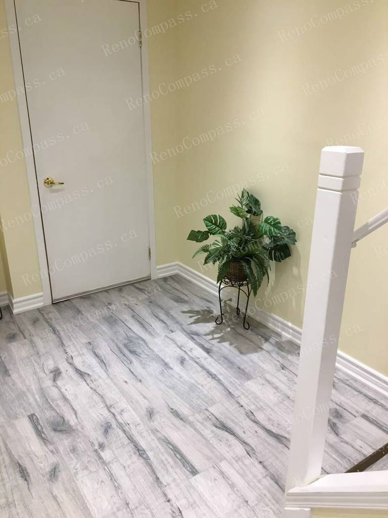This Mississauga basement renovation highlights a clean and modern basement entrance with updated flooring, neutral wall finishes, and improved lighting. Completed by a professional Toronto renovation company, the refreshed space enhances durability and visual appeal while supporting a functional one-bedroom, one-bathroom basement layout ideal for comfortable living or rental use.