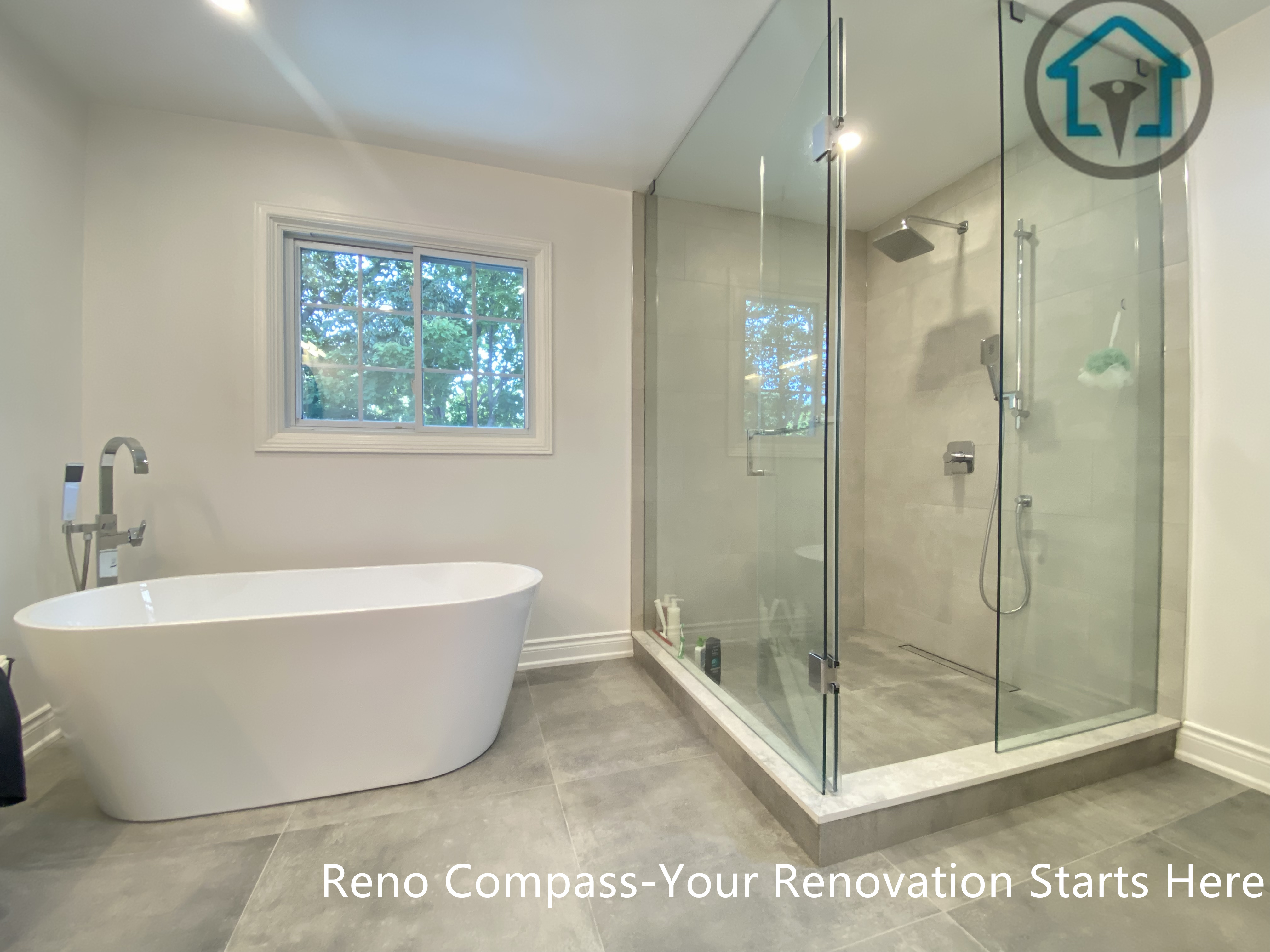 This image highlights the large-format porcelain floor tiles used in an Oakville bathroom renovation, creating a clean, seamless foundation for the space. The neutral grey tone enhances visual continuity, reduces grout lines, and improves long-term durability and ease of maintenance. Carefully aligned flooring transitions complement the modern bathroom layout and contribute to a refined, minimalist finish.