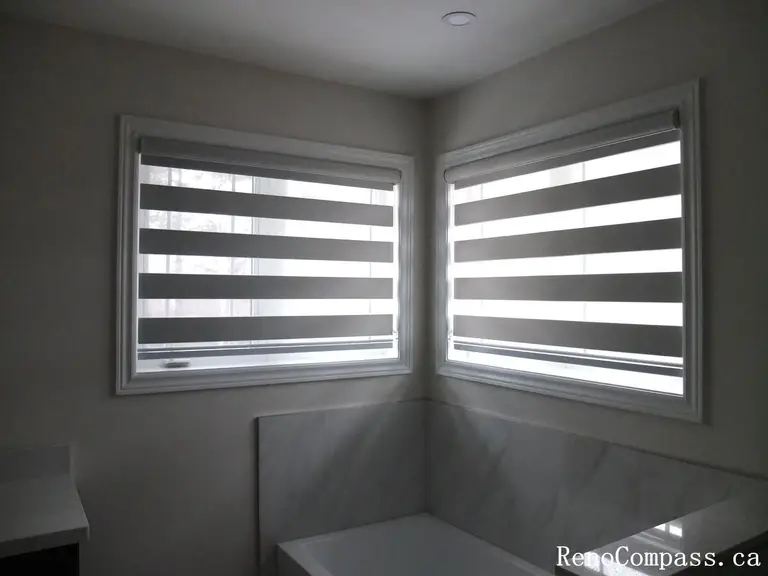 Custom zebra blinds curtains installation completed in Richmond Hill, featuring modern dual-layer window shades that provide privacy, light control, and a clean contemporary look. This professional window treatment upgrade enhances interior comfort and style, perfectly suited for modern home renovations by a trusted Toronto renovation company.
